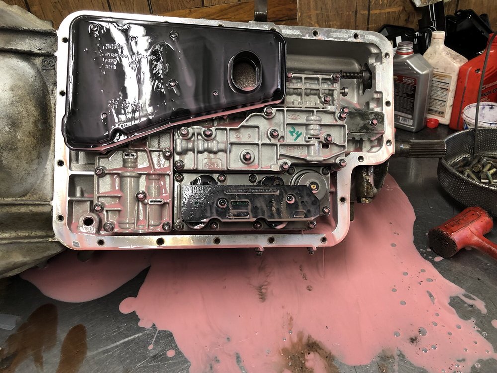 A transmission valve body on the workbench